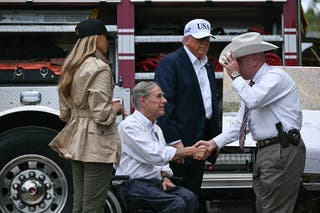 Trump, Melania and Texas Governor Greg Abbott meet with local officials and first responders in Kerrville, Texas on July 11